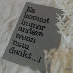 Postkarte "Es kommt anders" gestempelter Spruch