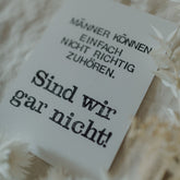 Postkarte "Männer können nicht zuhören" gestempelter Spruch