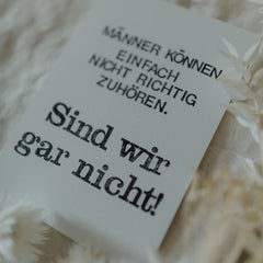 Postkarte "Männer können nicht zuhören" gestempelter Spruch