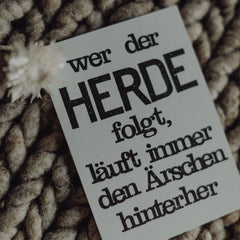 Postkarte "Wer der Herde folgt" gestempelter Spruch