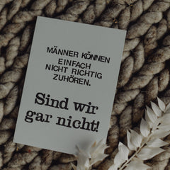 Postkarte "Männer können nicht zuhören" gestempelter Spruch