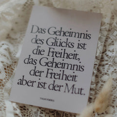 Postkarte "Geheimnis des Glücks" gestempelter Spruch
