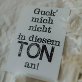 Postkarte "Ton angucken" gestempelter Spruch