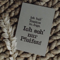 Postkarte "Tinnitus im Auge" gestempelter Spruch