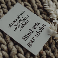 Postkarte "Männer können nicht zuhören" gestempelter Spruch