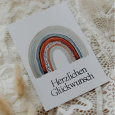 Postkarte "Herzlichen Glückwunsch Regenbogen" gestempelter Spruch