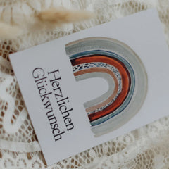 Postkarte "Herzlichen Glückwunsch Regenbogen" gestempelter Spruch