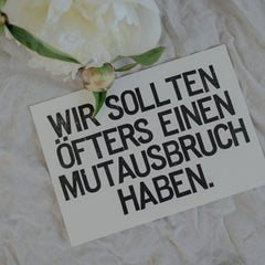 Postkarte "Mutausbruch" gestempelter Spruch