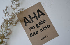 Postkarte "Aha" gestempelter Spruch