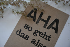 Postkarte "Aha" gestempelter Spruch