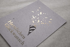 Kleine Karte "Herzlichen Glückwunsch" mit Luftschlangen Gold