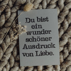 Postkarte "Ausdruck von Liebe" gestempelter Spruch