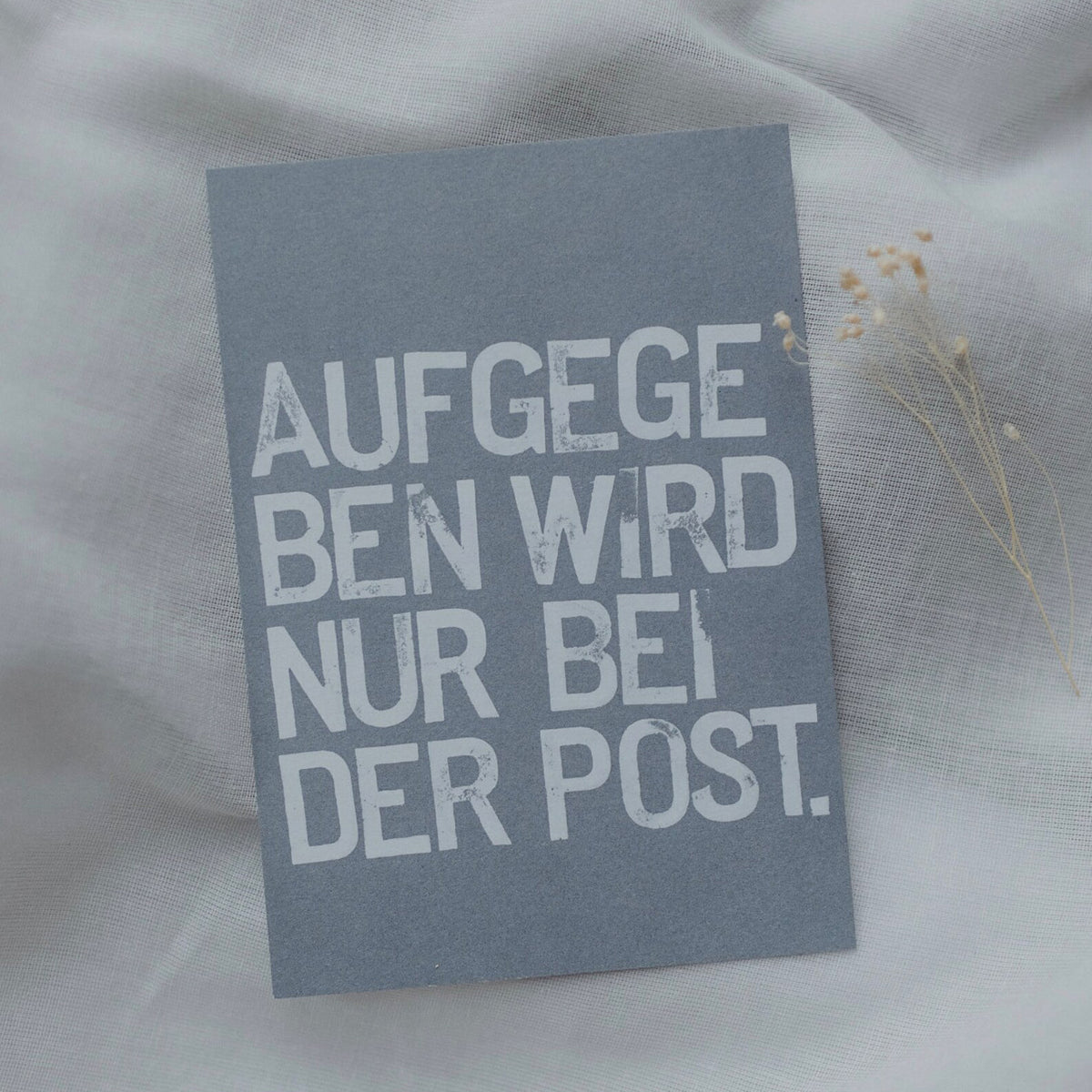 Postkarte "Aufgegeben wird nur bei der Post" gestempelter Spruch