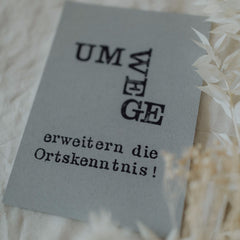 Postkarte "Umwege" gestempelter Spruch